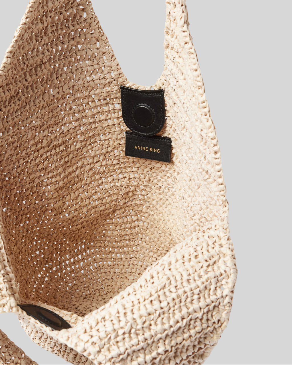 SMALL LEAH HOBO BAG NATURAL WITH BLACK