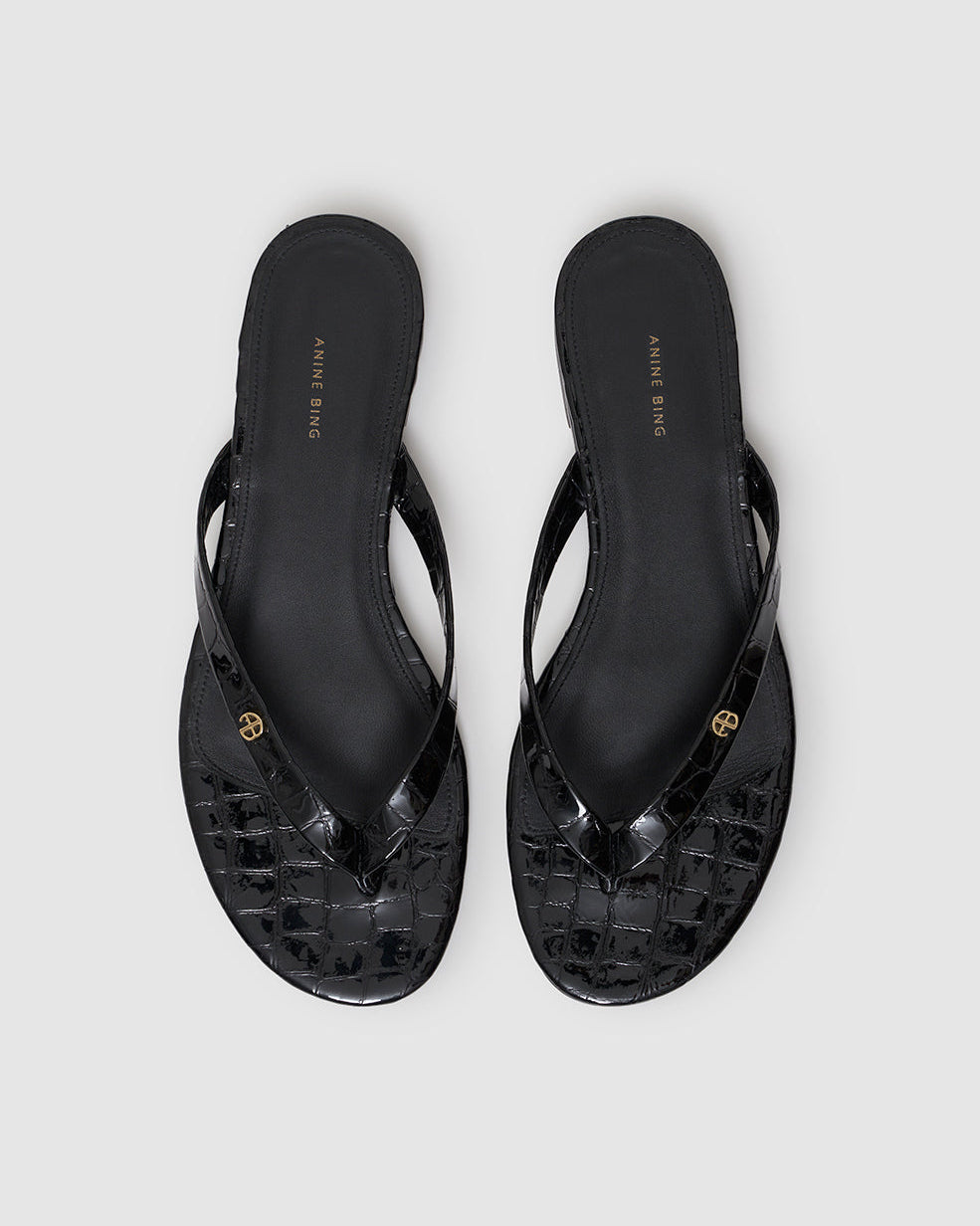 NOELLE EMBOSSED THONG SANDALS BLACK